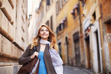 rome italy - Young woman strolling down street, Rome, Italy Stock Photo - Premium Royalty-Free, Code: 649-07585556