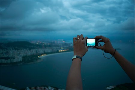 south american indian - Close up of female hands photographing view of Rio De Janeiro at night, Brazil Stock Photo - Premium Royalty-Free, Code: 649-07585767