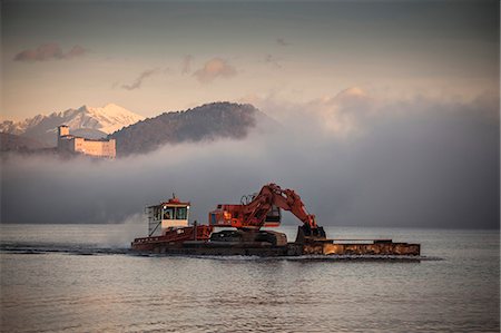 schlepper (boot) - Excavator on barge,  Lake Maggiore, Varese, Piemonte, Italy Stockbilder - Premium RF Lizenzfrei, Bildnummer: 649-07596473