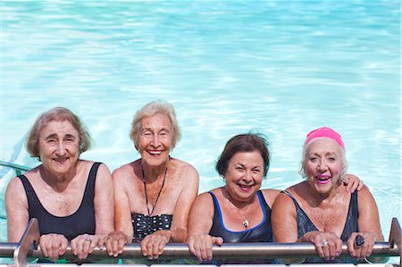 exuberant woman in sunlight - Portrait of four senior women in swimming pool Stock Photo - Premium Royalty-Free, Code: 649-07596669