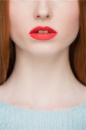 rot - Cropped image of young woman's lips Stockbilder - Premium RF Lizenzfrei, Bildnummer: 649-07647892