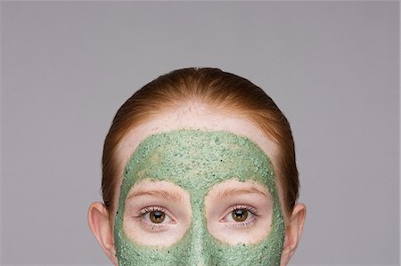 simsearch:649-07647896,k - Cropped image of young woman wearing face mask Foto de stock - Sin royalties Premium, Código: 649-07647907