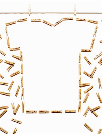 simsearch:649-08145726,k - Clothes line and white tshirt outlined with clothespins Stock Photo - Premium Royalty-Free, Code: 649-07648045