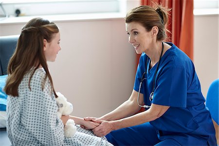 patient gown - Nurse talking to girl Stock Photo - Premium Royalty-Free, Code: 649-07709942