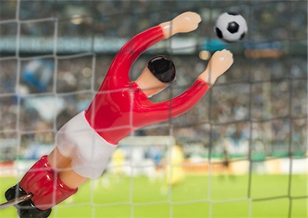security measures - Digitally generated close up image of soccer goalkeeper in stadium Stock Photo - Premium Royalty-Free, Code: 649-07710197
