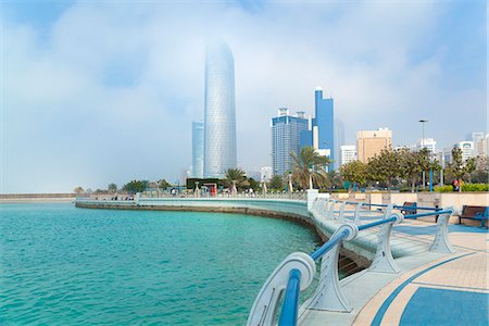 futuristic travel - Downtown Abu Dhabi, Landmark Tower, Baynunah Tower, United Arab Emirates Stock Photo - Premium Royalty-Free, Code: 649-07710290