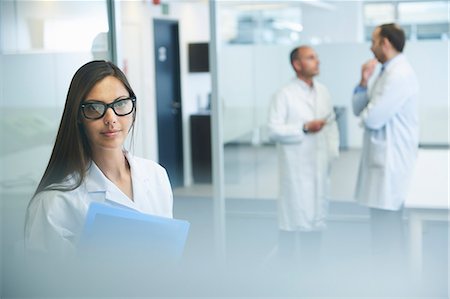 filing woman - Doctors at work in office Stock Photo - Premium Royalty-Free, Code: 649-07710472