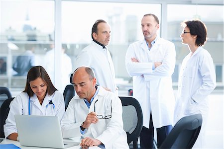 simsearch:649-07761045,k - Doctors in brainstorming meeting Stock Photo - Premium Royalty-Free, Code: 649-07710491