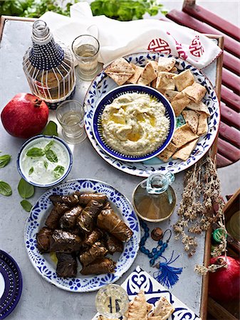 Still life of yogurt eggplant dips and dolmade Stock Photo - Premium Royalty-Free, Code: 649-07710529