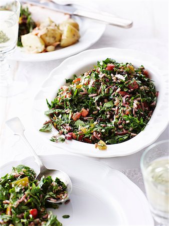 simsearch:614-07031903,k - Still life of festive tabouleh, fresh salad Photographie de stock - Premium Libres de Droits, Code: 649-07710542