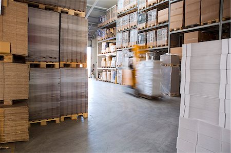 ship interiors - Blurred forklift truck in storage warehouse Stock Photo - Premium Royalty-Free, Code: 649-07710763