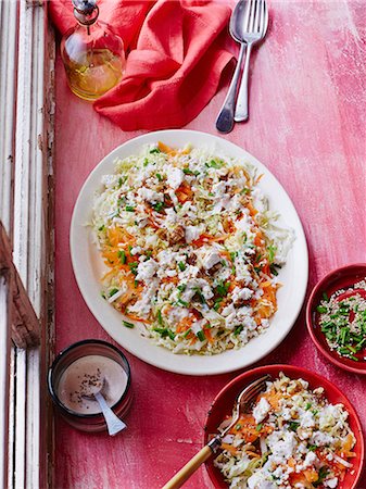 dinner plates on table not people - Shredded cabbage, sesame and feta salad Stock Photo - Premium Royalty-Free, Code: 649-07736523