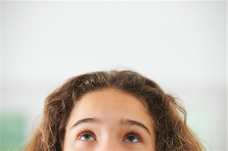 face looking up - Portrait of young girl, focus on eyes Stock Photo - Premium Royalty-Free, Code: 649-07736660