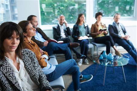simsearch:649-07736690,k - People sitting in waiting room Stock Photo - Premium Royalty-Free, Code: 649-07736694
