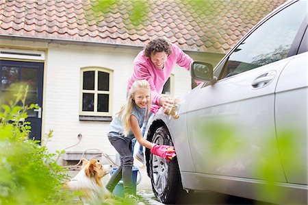 family by car - Girl helping father wash his car Stock Photo - Premium Royalty-Free, Code: 649-07736710