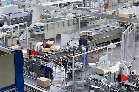 plant assembly line worker - Male and female workers, working in paper packaging factory Stock Photo - Premium Royalty-Free, Code: 649-07736976