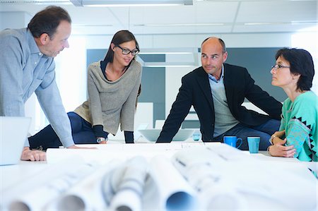 Group of business people discussing plans Stock Photo - Premium Royalty-Free, Code: 649-07761037