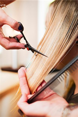 scissors and hair cut women - Woman having haircut in salon Stock Photo - Premium Royalty-Free, Code: 649-07761124