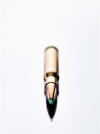 Close up of golden bullet Stock Photo - Premium Royalty-Free, Code: 649-07804041