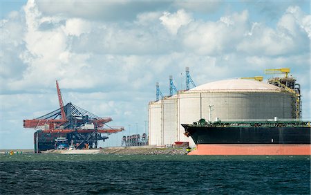 south holland - Huge tanks for LNG or liquid natural gas, in the rotterdam harbour Stock Photo - Premium Royalty-Free, Code: 649-07804059