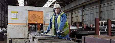 Portrait of a steelworker in his working environment Stock Photo - Premium Royalty-Free, Code: 649-07804374