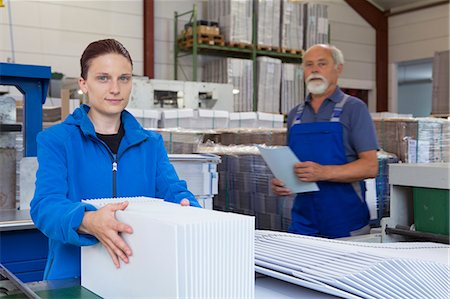 simsearch:649-07804440,k - Factory workers working with cardboard Stock Photo - Premium Royalty-Free, Code: 649-07804444