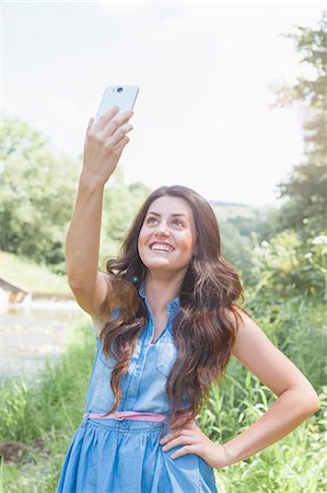 simsearch:649-07804544,k - Young woman taking selfie Stock Photo - Premium Royalty-Free, Code: 649-07804541