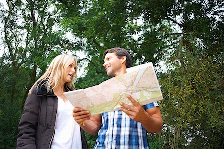 people walking in woods - Couple map reading on walk Stock Photo - Premium Royalty-Free, Code: 649-07804582