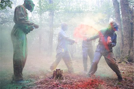 powder (fine particles) - Paintball players in action Stock Photo - Premium Royalty-Free, Code: 649-07804594