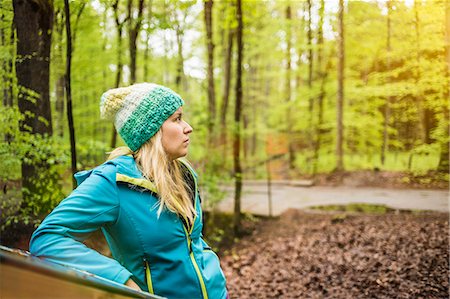 simsearch:649-07239774,k - Young woman standing in forest looking away Stock Photo - Premium Royalty-Free, Code: 649-07804657