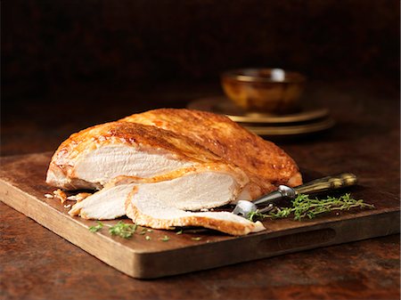 simsearch:614-08877654,k - Christmas dinner. Free range butter basted turkey breast with thyme Foto de stock - Sin royalties Premium, Código: 649-07804849