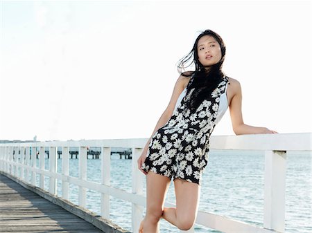 port melbourne - Portrait of young woman leaning against pier railings, Port Melbourne, Melbourne, Victoria, Australia Stock Photo - Premium Royalty-Free, Code: 649-07804937