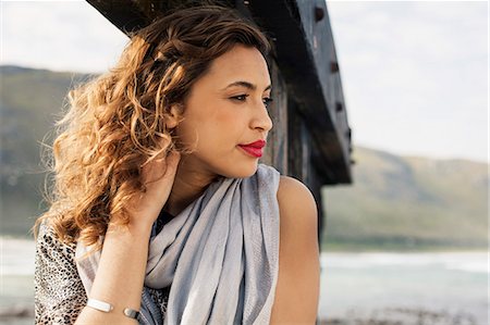 simsearch:614-08202342,k - Young woman daydreaming on coastal pier, Cape Town, Western Cape, South Africa Stock Photo - Premium Royalty-Free, Code: 649-07803298