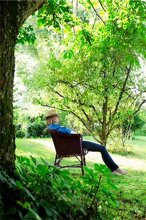 sleeping backyard - Mid adult woman asleep in garden chair Stock Photo - Premium Royalty-Free, Code: 649-07803448