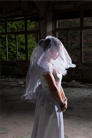 photographs of sad waiting women - Portrait of bride in empty abandoned interior Stock Photo - Premium Royalty-Free, Code: 649-07803718