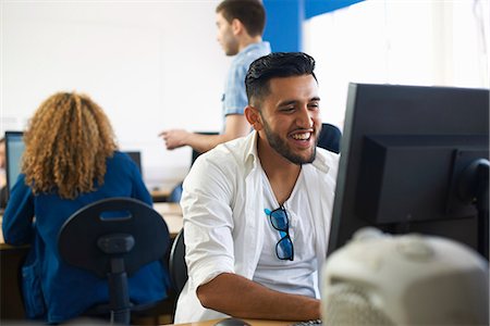 simsearch:649-07803635,k - College students using personal computers in classroom Stock Photo - Premium Royalty-Free, Code: 649-07803907