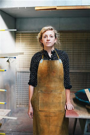 Portrait of young craftswoman in organ workshop Photographie de stock - Premium Libres de Droits, Code: 649-07905051