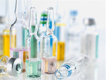 Selection of drugs including vials, ampules and vaccines illustrating medical research Stock Photo - Premium Royalty-Free, Code: 649-07905077
