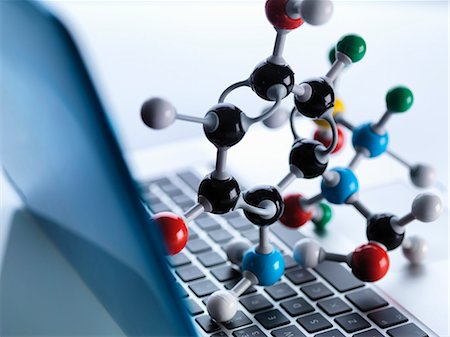 simsearch:614-08982748,k - Molecular model sitting on top of lap top computer keyboard to illustrate science education and computer aided research Stock Photo - Premium Royalty-Free, Code: 649-07905104