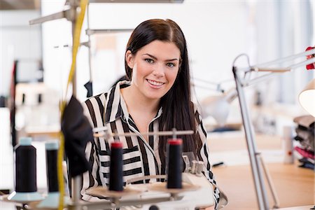 simsearch:649-07905510,k - Portrait of young female seamstress in workshop Stock Photo - Premium Royalty-Free, Code: 649-07905489