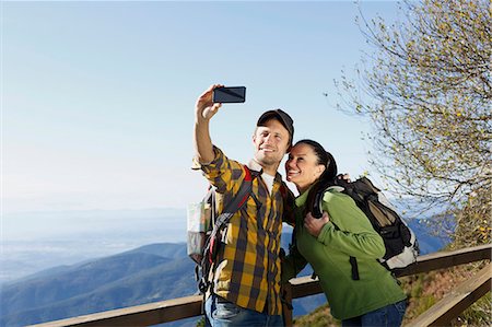 Hikers taking selfie, mountains in background, Montseny, Barcelona, Catalonia, Spain Stock Photo - Premium Royalty-Free, Code: 649-08060457