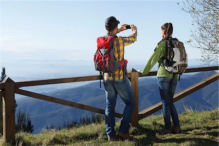 Hikers taking photograph of mountains, Montseny, Barcelona, Catalonia, Spain Photographie de stock - Premium Libres de Droits, Code: 649-08060458