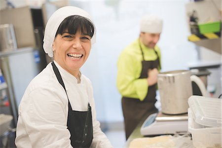 food industry people not restaurant - Bakers working in kitchen Stock Photo - Premium Royalty-Free, Code: 649-08084548