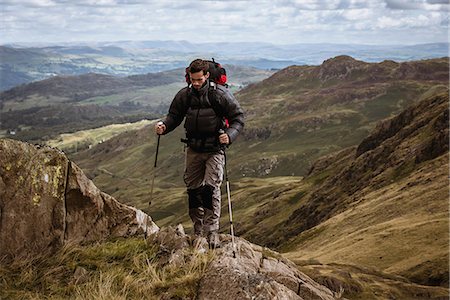 simsearch:649-08084705,k - Young male hiker moving up mountain, The Lake District, Cumbria, UK Stockbilder - Premium RF Lizenzfrei, Bildnummer: 649-08084708