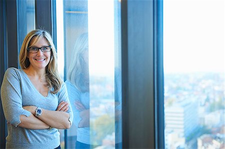 Portrait of businesswoman in skyscraper office, Brussels, Belgium Foto de stock - Sin royalties Premium, Código: 649-08084760