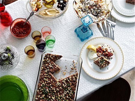 Still life with kibbeh and bowl of pickles Stock Photo - Premium Royalty-Free, Code: 649-08085185