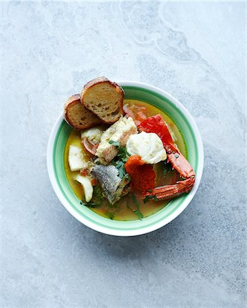 simsearch:649-08085196,k - Still life with a bowl of bouillabaisse and bread Stock Photo - Premium Royalty-Free, Code: 649-08085189