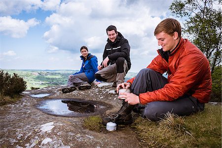 simsearch:649-07437550,k - Male and female hikers preparing camping stove on Guise Cliff, Pateley Bridge, Nidderdale, Yorkshire Dales Photographie de stock - Premium Libres de Droits, Code: 649-08085327