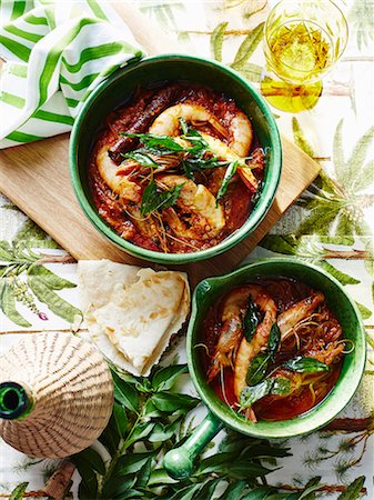 seafood festival - Casserole of prawns and garnish with glass of Indian coconut vinegar Stock Photo - Premium Royalty-Free, Code: 649-08085413