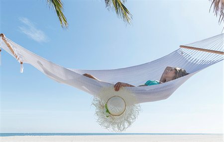 simsearch:649-08086498,k - Young woman reclining on hammock on Miami Beach, Florida, USA Stockbilder - Premium RF Lizenzfrei, Bildnummer: 649-08085444